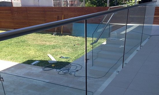 Steel handrail with glass balustrade